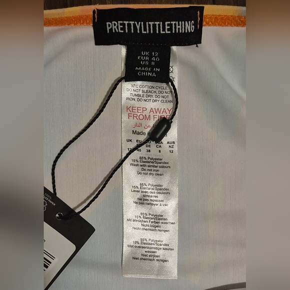 PrettyLittleThing Peach Pastel Abstract Print Plunge Ruched Swimsuit - Picture 5 of 7